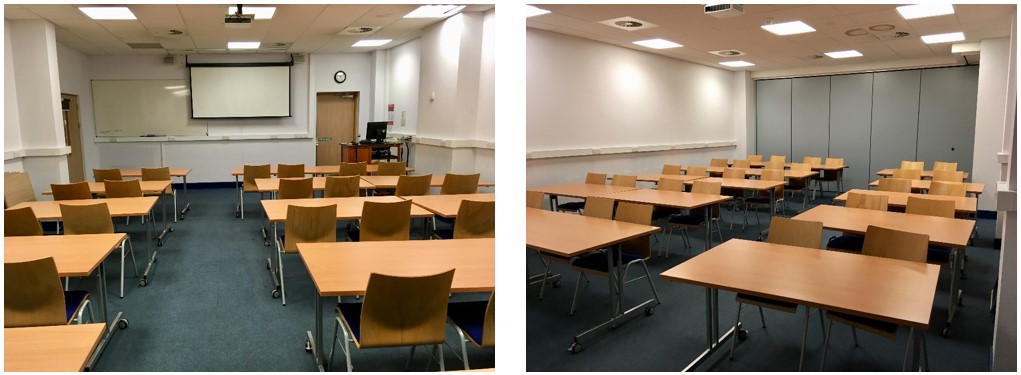 Classroom with rows of tables and chairs.